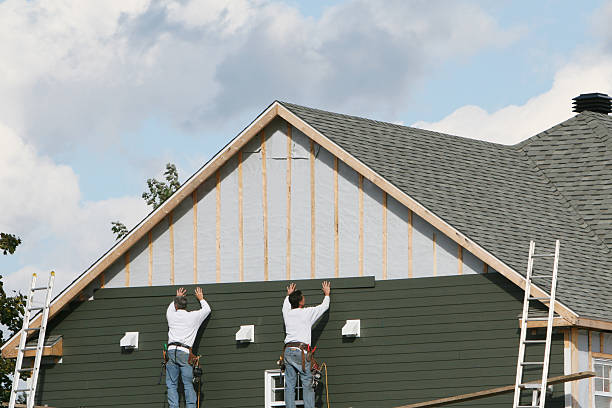 Professional Emergency Siding Repair technician working in Milroy, PA